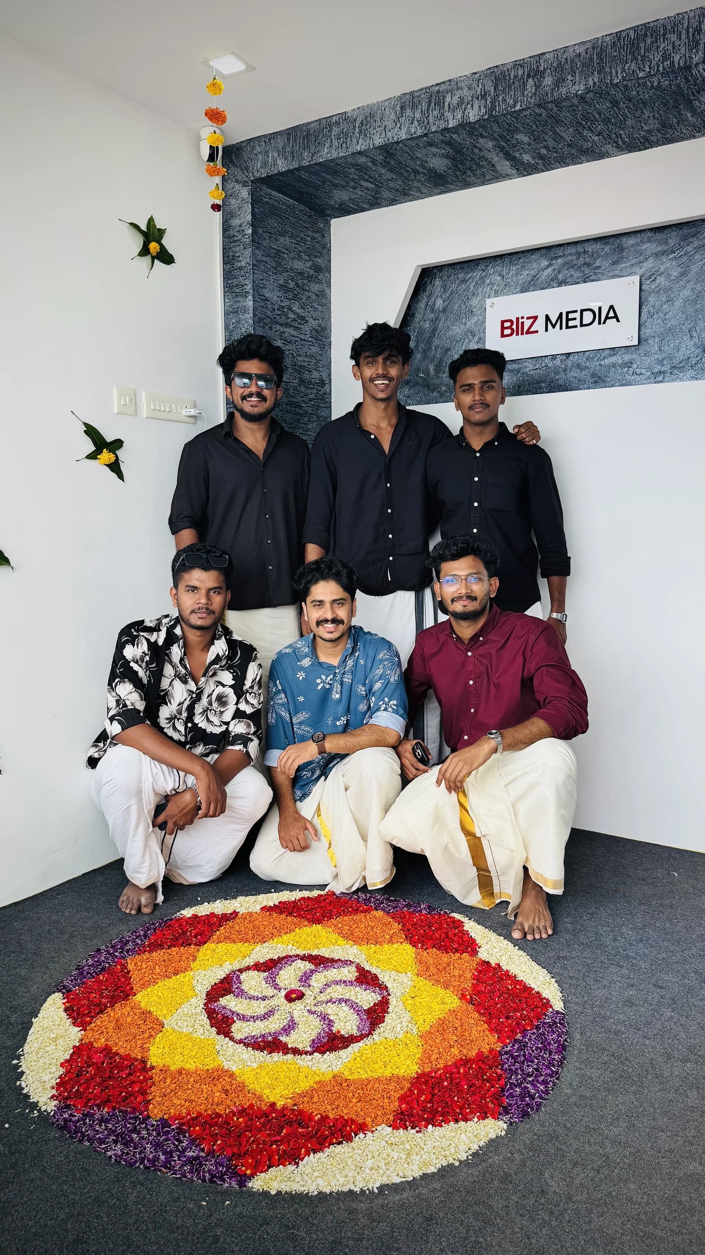 Bdot team celebrating Onam with a flower pookalam